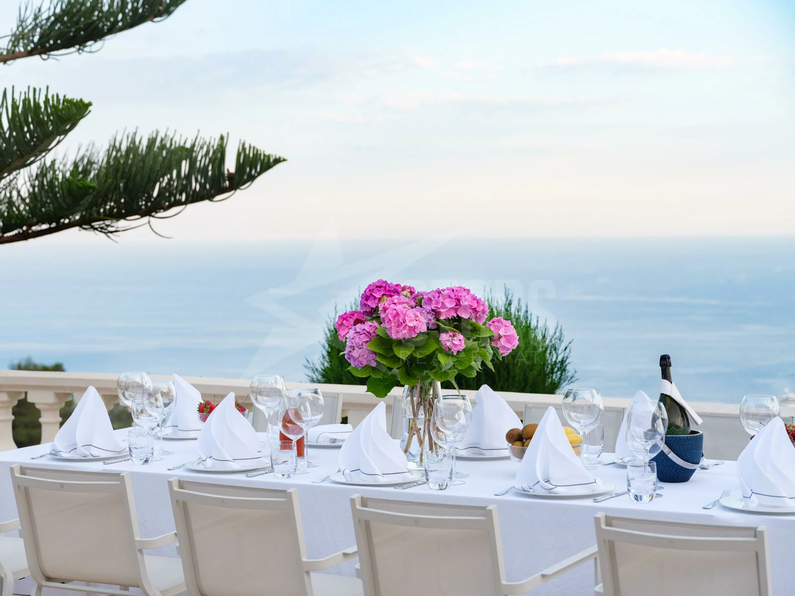 dining table outside with sea view