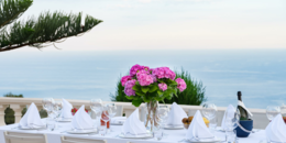 dining table outside with sea view